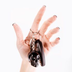 Handmade biker keychain with a black skull charm