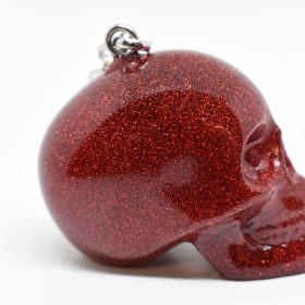 gothic red keychain design – close-up of red glitter skull keychain with bold red keychain appeal
