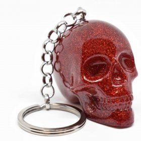valentine’s day skull keychain – side view of red glitter skull keychain with horror-themed keychain flair