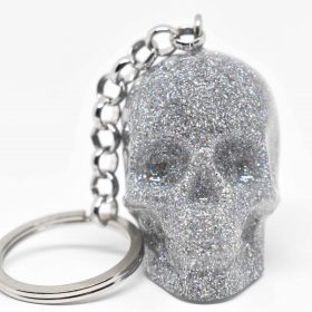 punk rock keychain featuring a silver glitter skull design
